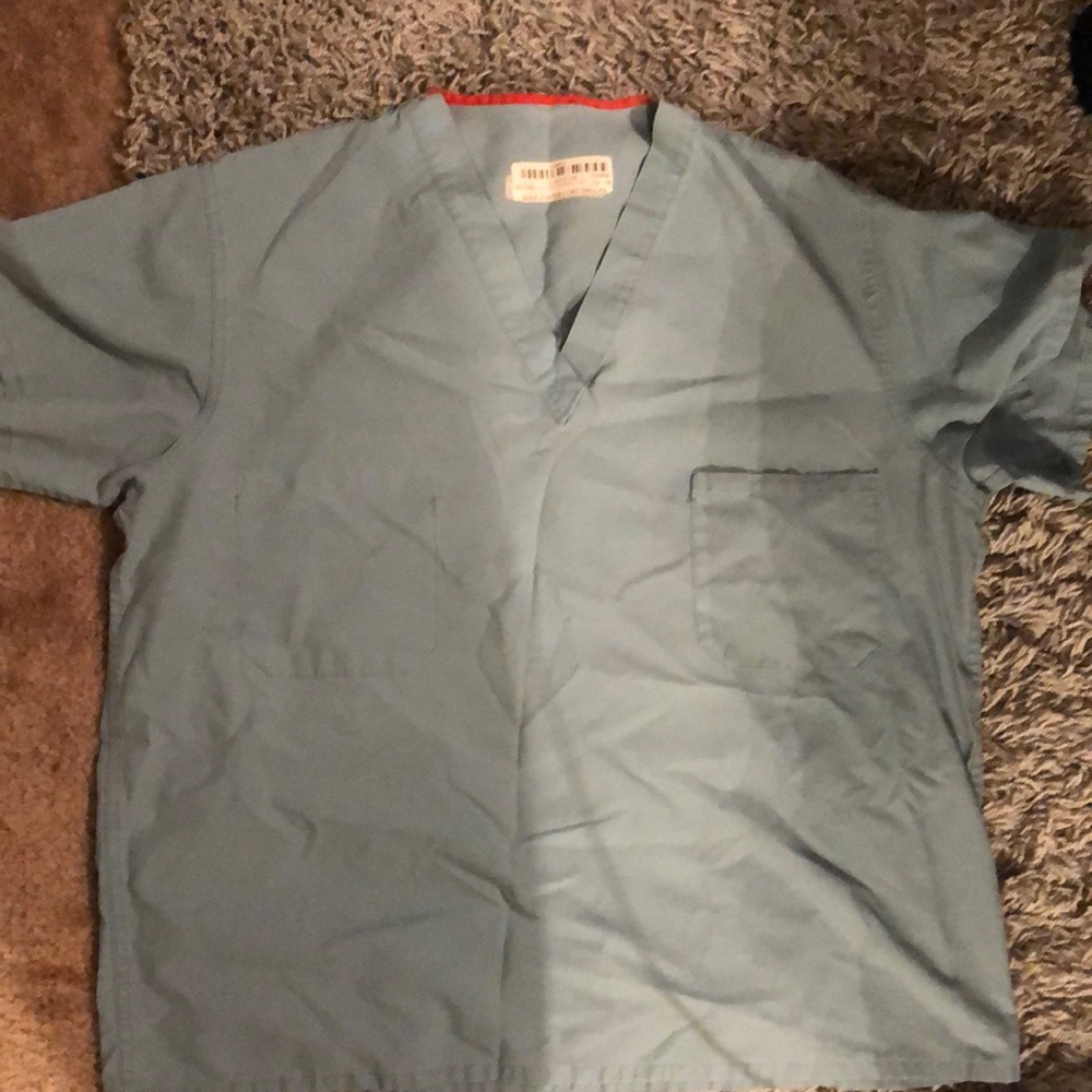 One XL unisex pale green/ surgical green scrub top